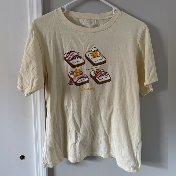 EUC Uniqlo Gudetama Graphic T-Shirt in Cream Yellow - Picture 1 of 5